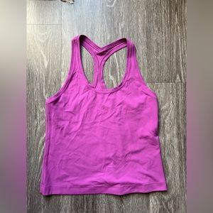 Lululemon tank top. Size 8. Slightly worn. Wrinkles from storage.
